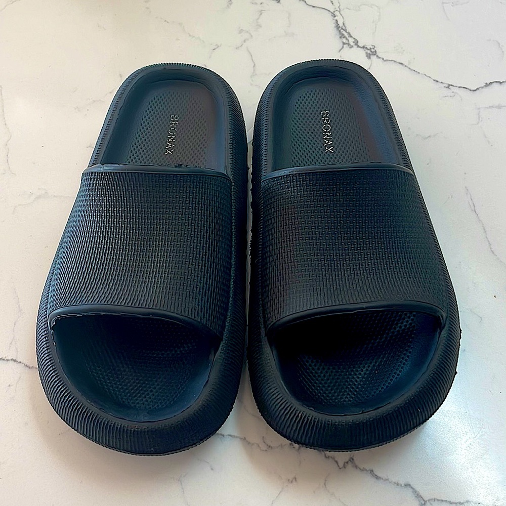 Black slide flip flops